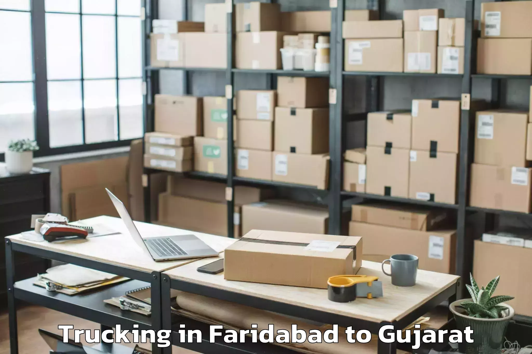 Faridabad to Tilakvada Trucking